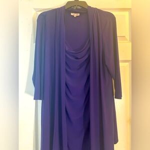 Women’s mid length dress. Two piece attached. Elegant for special occasions.